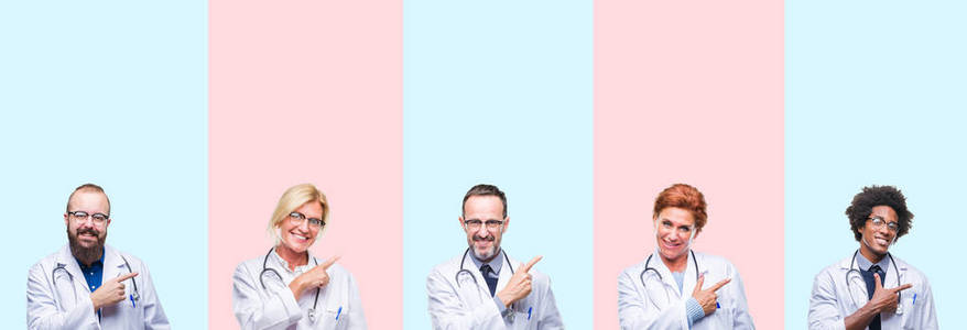 集体专业医生穿着医疗制服，在孤立的背景上欢快地笑着，用手和手指指向一边，脸上表情愉快而自然地看着镜头。