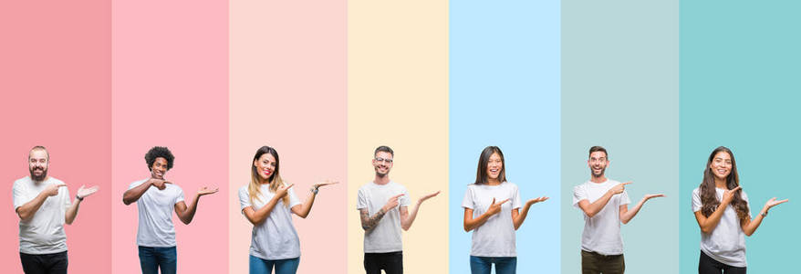 不同种族的年轻人穿着白色t恤，在五颜六色的孤立背景上，惊讶和微笑的相机，同时呈现手和手指。