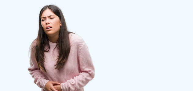 手放在肚子上,因为消化不良,痛苦的疾病,感觉不舒服