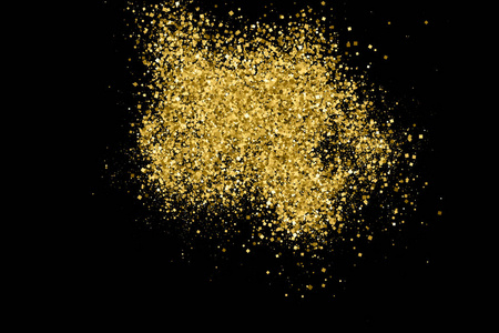 金色闪光的纹理隔离在黑色上。 琥珀颗粒的颜色。 庆祝背景。 纸屑的金色爆炸。 矢量插图EPS10。