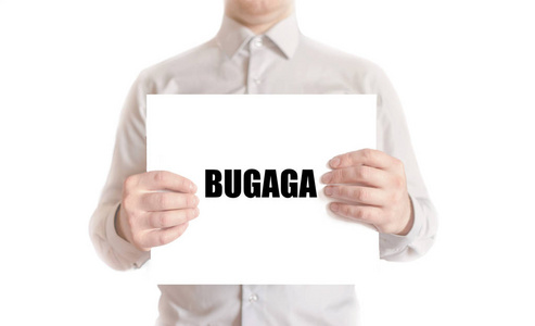 作者签名在自己的书在木桌上光效果: 背景模糊的亲笔签名照片-正版商用