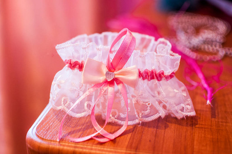 s pink garter on the table