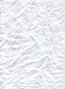 皱皱的皱褶纸纹理或背景. 皱巴巴的纸的质地. 白纸单.照片