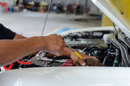 s hands, checking machine of automobile.