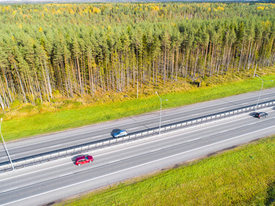 s eye photo of highway. Expressway. Road junctions. Car passing.