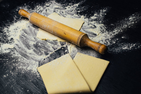 s roll with a rolling pin and flour with copy space.