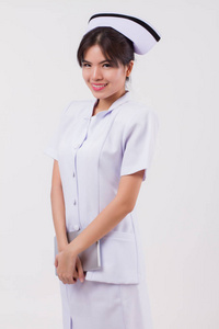  studio isolated portrait of asian female nurse in positive, fri