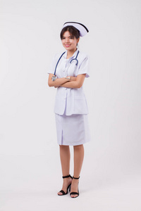  studio isolated portrait of confident asian female nurse with s