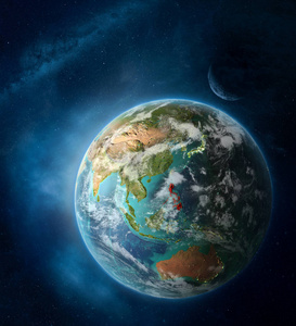 菲律宾从地球上的太空包围着月球和银河。 详细的行星表面与城市灯和云。 三维插图。 这幅图像的元素由美国宇航局提供。