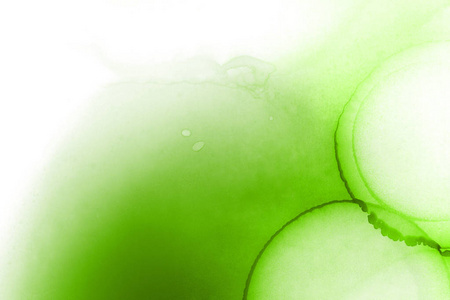 绿色墨水污渍纹理抽象背景图片