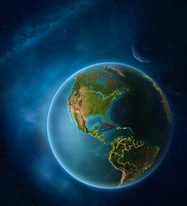 行星地球与突出的古巴在空间与月亮和银河系。 可见的城市灯光和国家边界。 三维插图。 这幅图像的元素由美国宇航局提供。