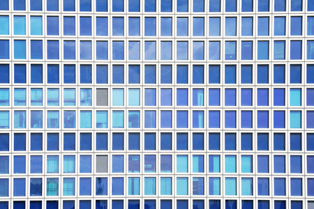蓝色的玻璃大厦玻璃蓝色夸尔窗的立面现代城市商务大厦摩天大楼.