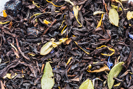 干红茶的质地，浆果和蓝莓和蔓越莓的叶子，特写成分，饮料，提取背景