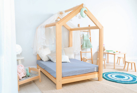 s room interior with cute bed