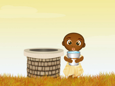 非洲儿童把水带到井里