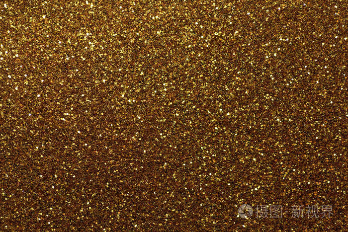 暗金闪闪发光的背景从小亮片特写. 来自纺织品的明亮闪亮的背景.