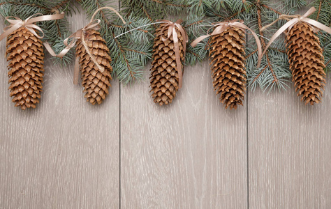 s branches on wooden background.