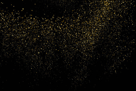 琥珀颗粒的颜色. 庆祝背景. 纸屑的金色爆炸. 设计元素.