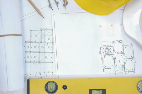 建筑师工程师工作场所房地产项目的房屋蓝图。 建筑计划。 建筑施工工具