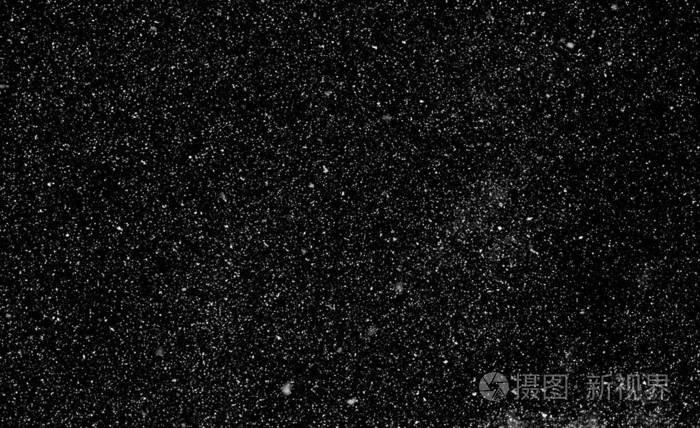 雪星白点在黑色背景下旋转
