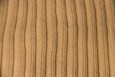 背景米黄色针织纱线暖直散装条纹