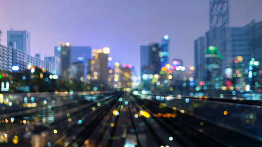 火车轨道双曝光模糊夜光城市市中心抽象背景