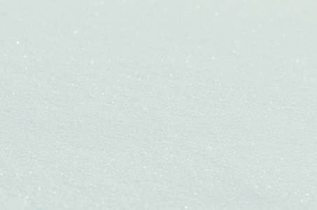 新鲜的雪背景。 白色结晶雪质地。