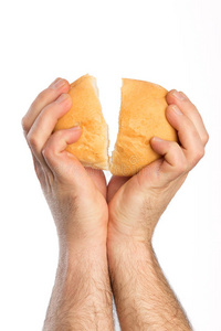 掰手手掰面包与背景隔绝照片