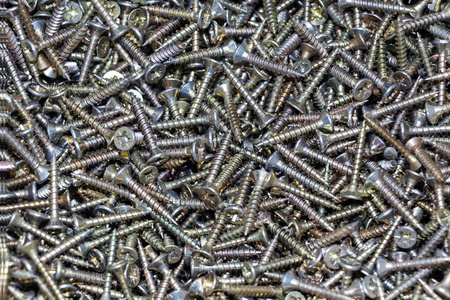 黑色螺丝纹理背景特写现代金属混合多样性.照片