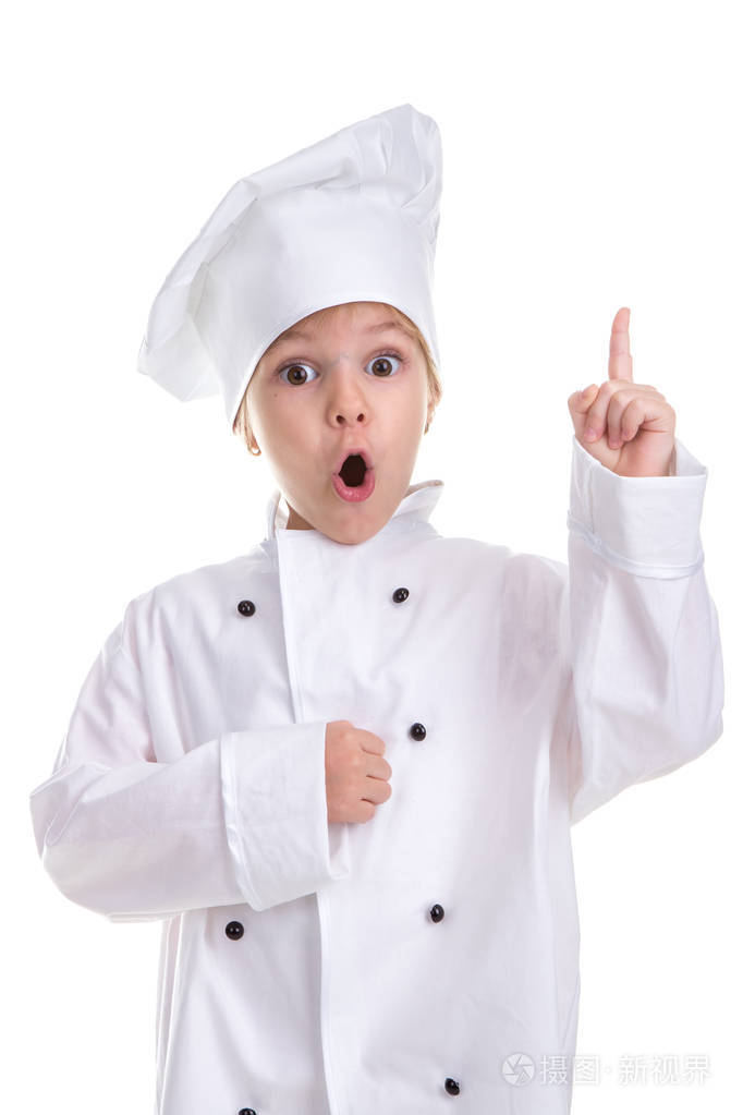 惊讶的女孩厨师白色制服隔离在白色的背景, 直视着相机与尖尖的手指。人像图像
