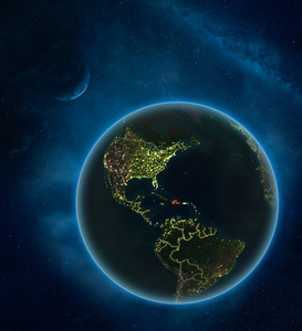多米尼加共和国夜间从太空与月亮和银河。 详细的行星地球与城市灯和可见的国家边界。 三维插图。 这幅图像的元素由美国宇航局提供。