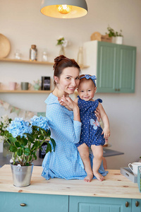 s day greeting card. Family mother and baby daughter in morning 