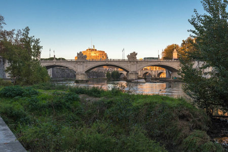 Angelo in Rome at Sunset from the River Tiber and its Natural co