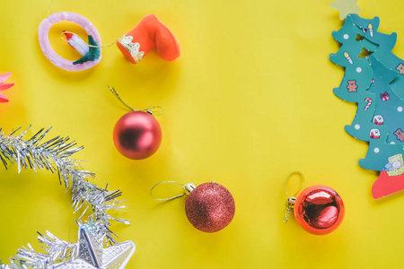 s boot,red ball, fir tree branches with