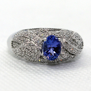  Diamond Ring 14K .85TCW Tanzanite Oval .21TCW Round Diamond