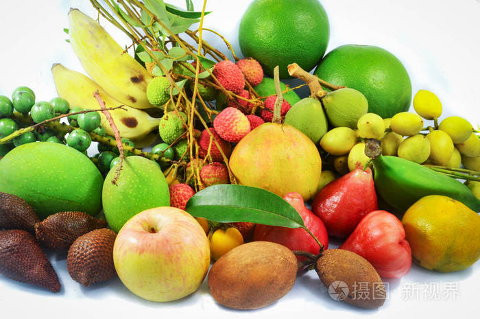 新鲜热带水果/泰国本地水果有机混合堆白色背景/彩色热带水果许多