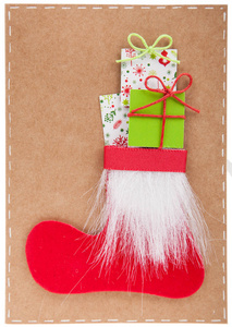 圣诞卡，手工制作。带礼品盒的圣诞袜子。圣诞节节日庆祝概念