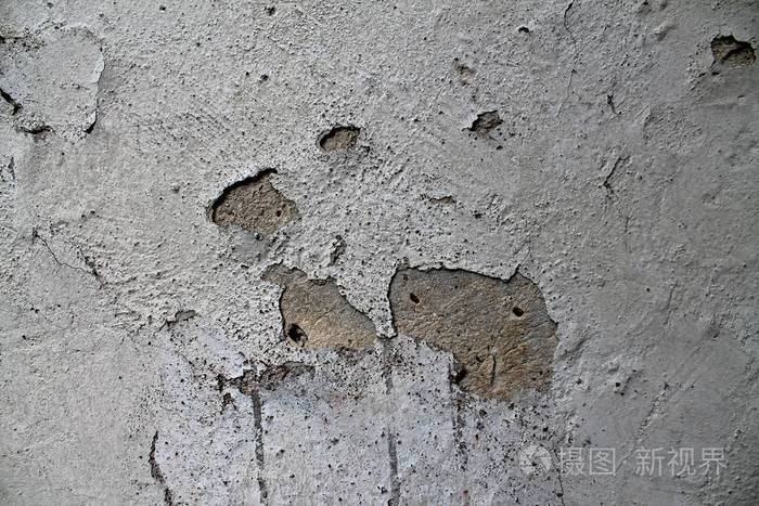 封闭旧的和风化的水泥墙上的裂缝