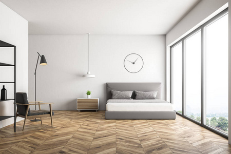主卧室内部有白色墙壁，木地板，床上有灰色的被子，上面挂着钟，木制床头柜和灰色扶手椅。3D渲染