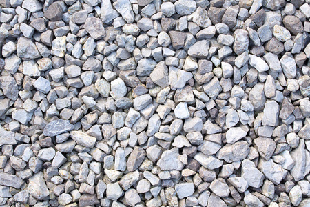 砾石质地. 小石头,小石头,许多灰色,白色和蓝色的鹅卵石.