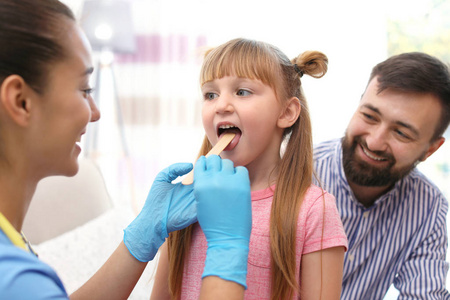 s doctor examining little girl39