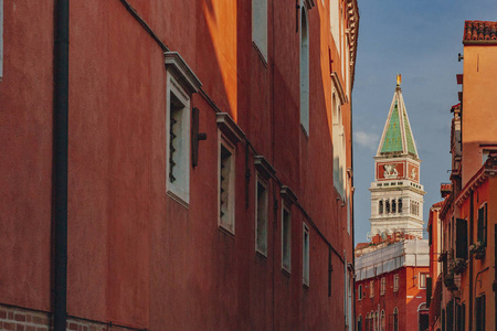 s Bell Tower between venetian architecture in Venice, Italy