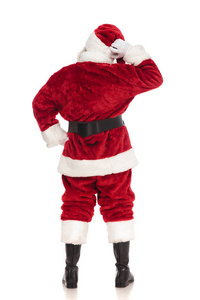 站在白色背景上的圣诞老人站在白色背景上的全长图片的背面视图