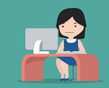 办公室工作的小女孩带着台式电脑照片