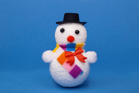 s snowman on a blue background. Christmas background