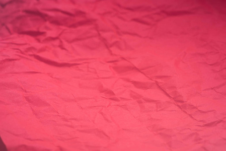 红色折痕纸背景纹理选择焦点图片