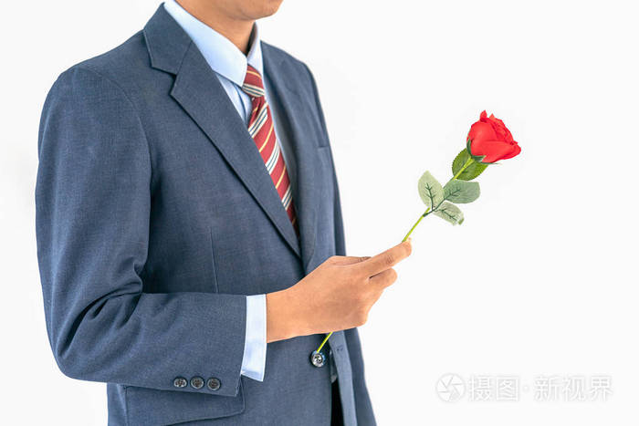 商人在西装与红玫瑰在白色