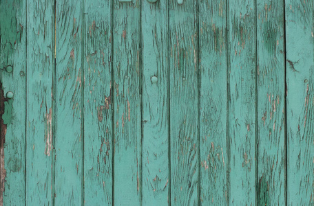 旧的木墙背景或纹理，旧的木墙漆成绿色。