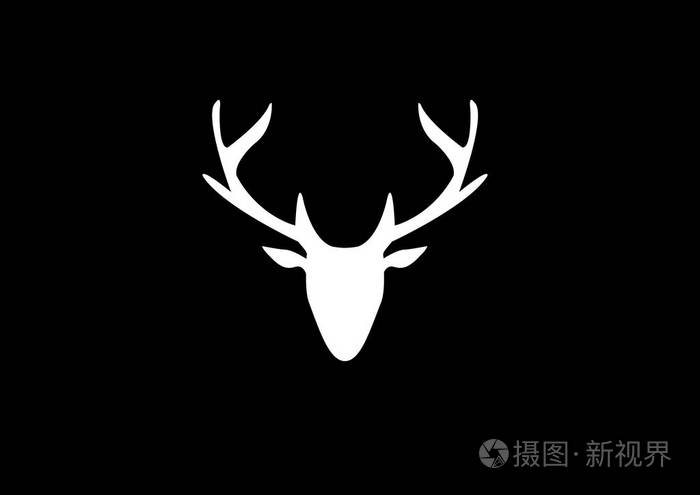 一个白色鹿头的剪影在黑暗的背景