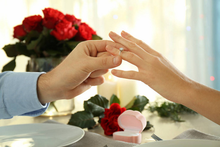 s finger at romantic date